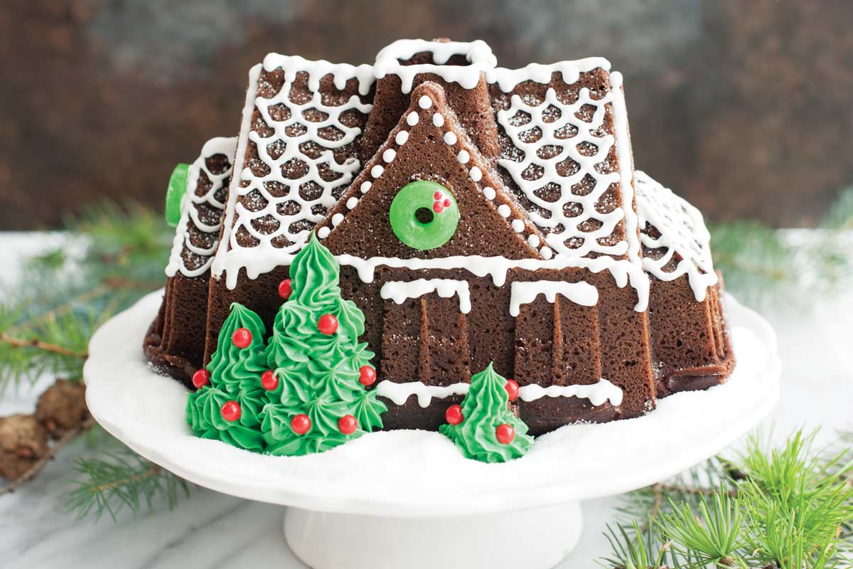 https://www.nordicware.com.au/wp-content/uploads/recipe-hero-christmas-gingerbread-house-cake.jpg
